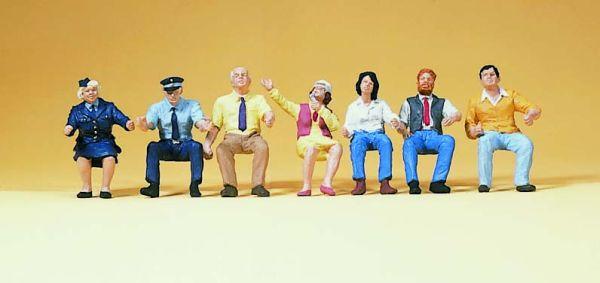 Personnel et passagers assis dans Tramway