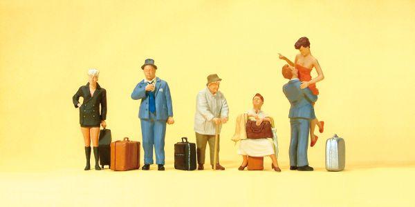 Voyageurs avec valises