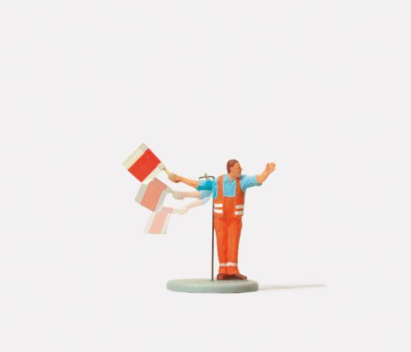 Ouvrier avec signal à main