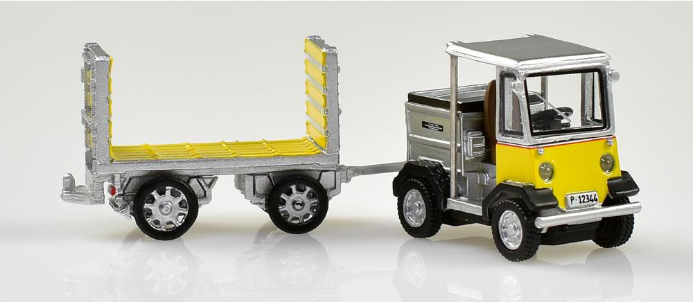 Tracteur a accumulateurs et remorque